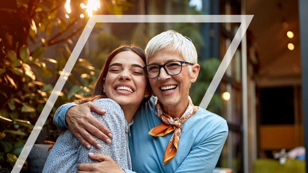 two women hugging, two happy women, female financial advisors, Nova Scotia, Halifax, Annapolis Valley